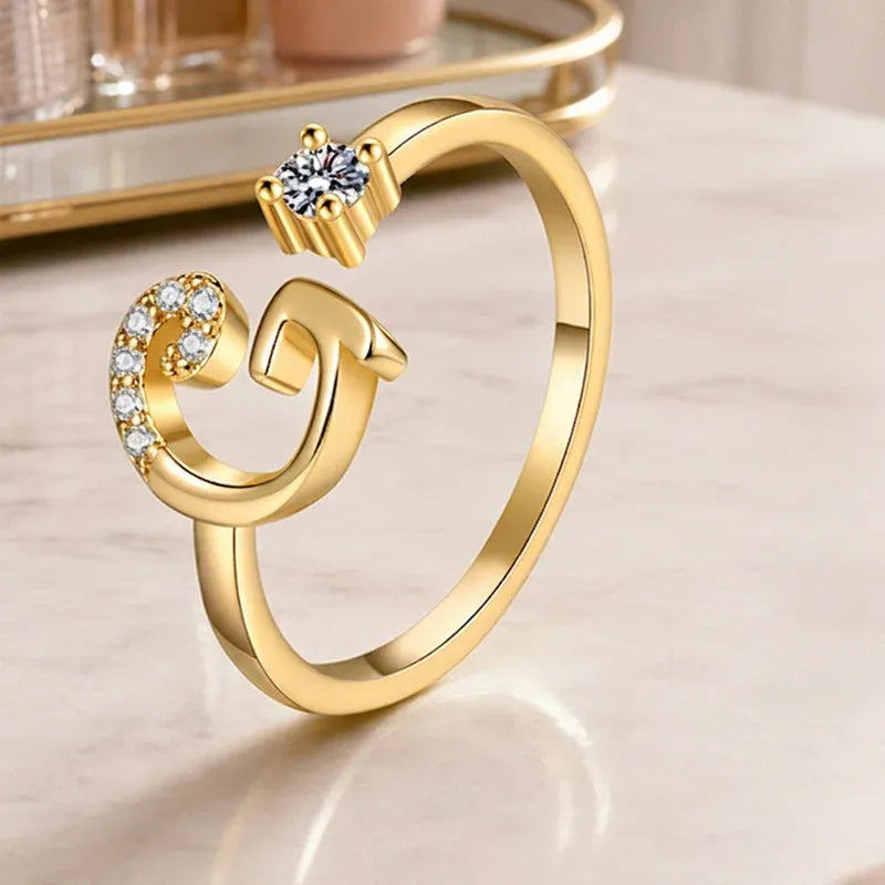 ⏰Offerta a tempo limitato💍Anello regolabile con iniziale scintillante da donna