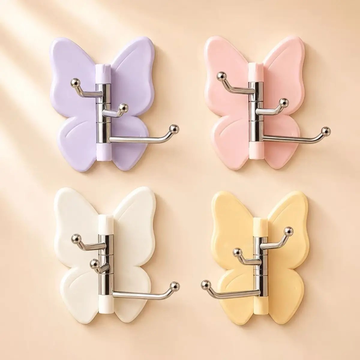 🔥Ultimo giorno di sconto del 50% – 🦋 Ganci a farfalla rotanti senza foratura (confezione da 4)